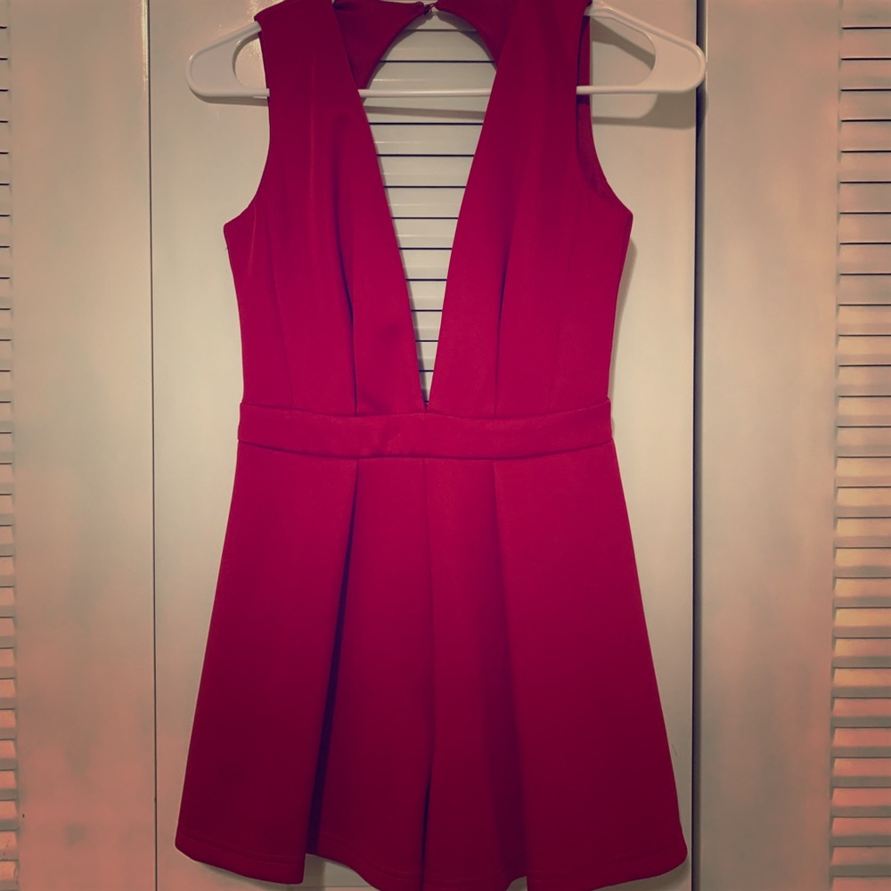 Sexy red plunging neckline romper